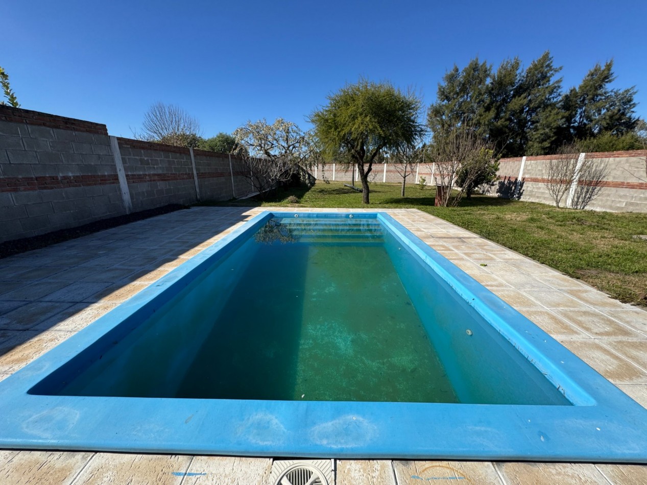 SE VENDE CASA CON AMPLIO TERRENO