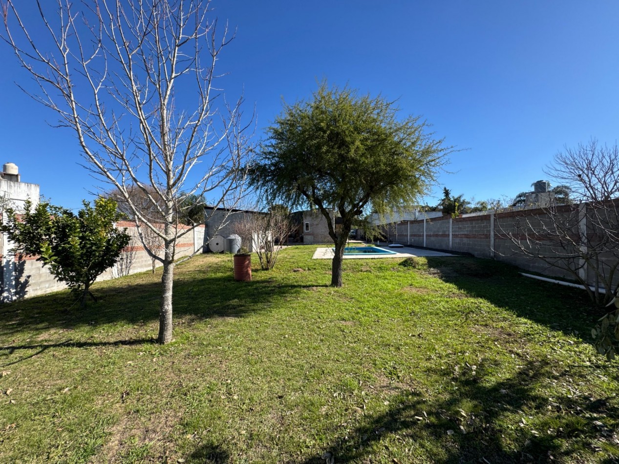 SE VENDE CASA CON AMPLIO TERRENO