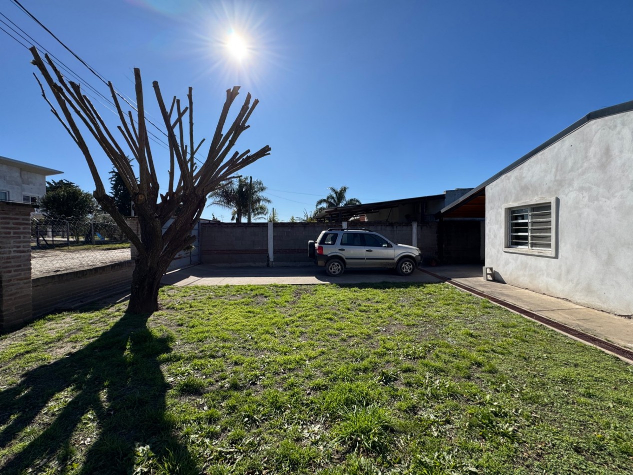 SE VENDE CASA CON AMPLIO TERRENO