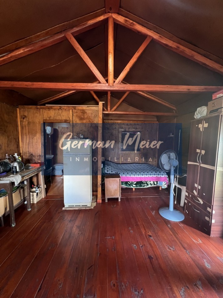 EN VENTA CABAÑA EN AMPLIO LOTE ZONA AUTODROMO