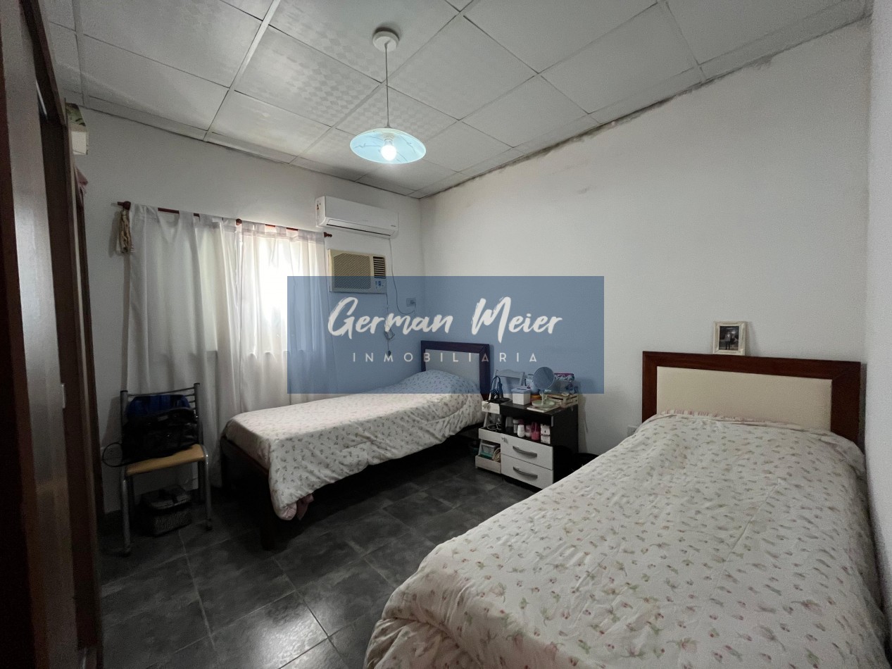 CASA EN VENTA CON AMPLIO PATIO VERDE  En Colonia Avellaneda.
