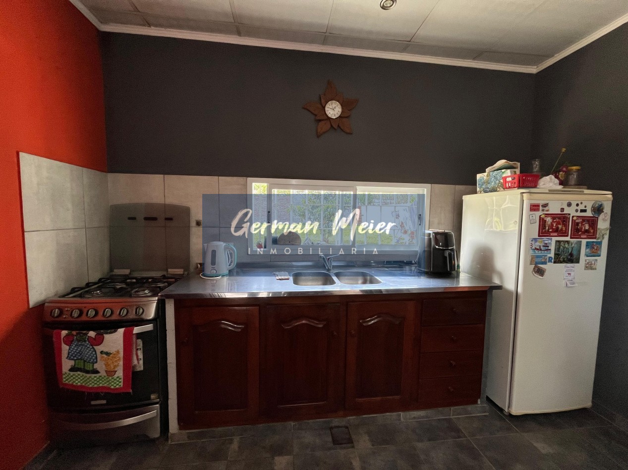 CASA EN VENTA CON AMPLIO PATIO VERDE  En Colonia Avellaneda.