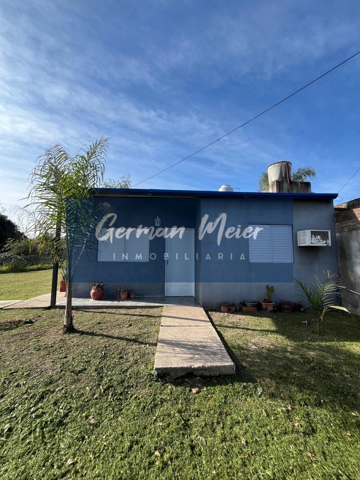CASA EN VENTA CON AMPLIO PATIO VERDE  En Colonia Avellaneda.