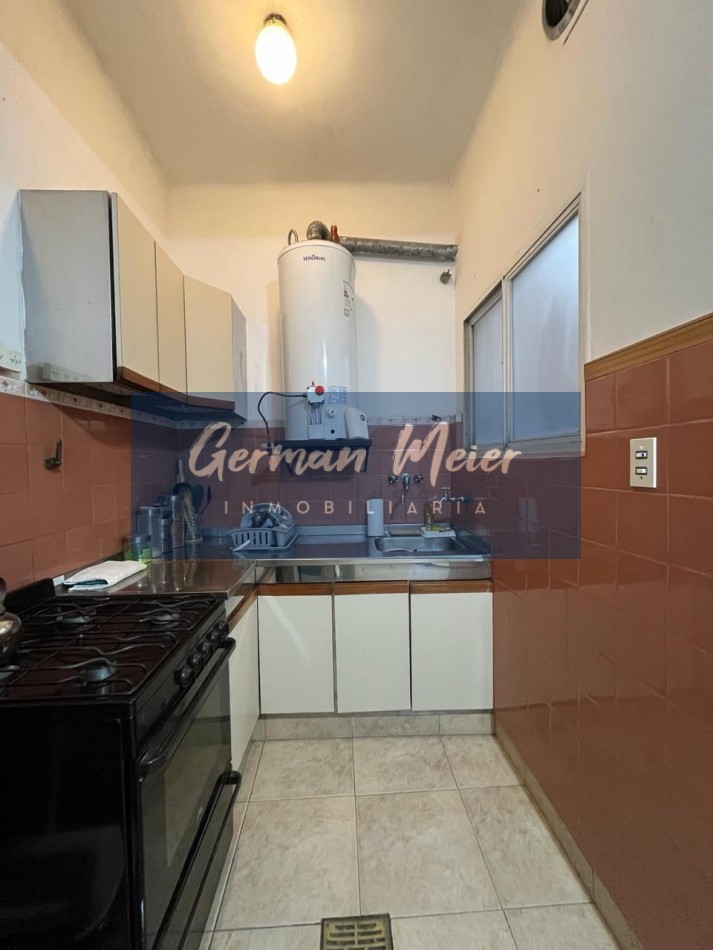 EN VENTA PROPIEDAD CENTRICA EN PLANTA ALTA CON LOCAL COMERCIAL